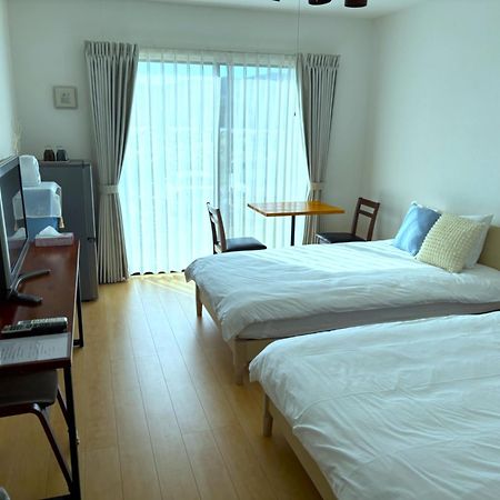 Nakijin Resort Guest House Exterior photo